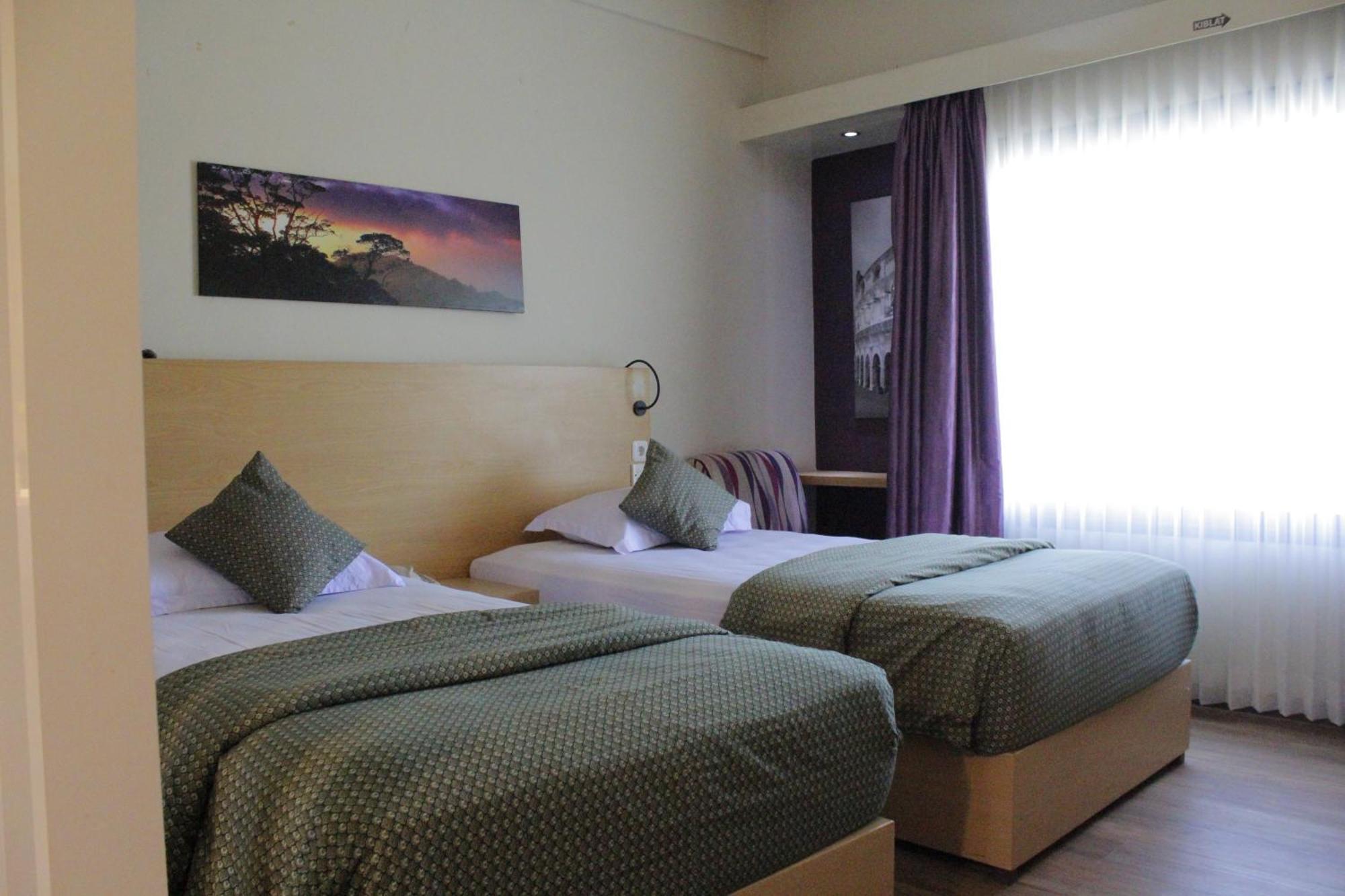 Lux Tychi Hotel 말랑 외부 사진